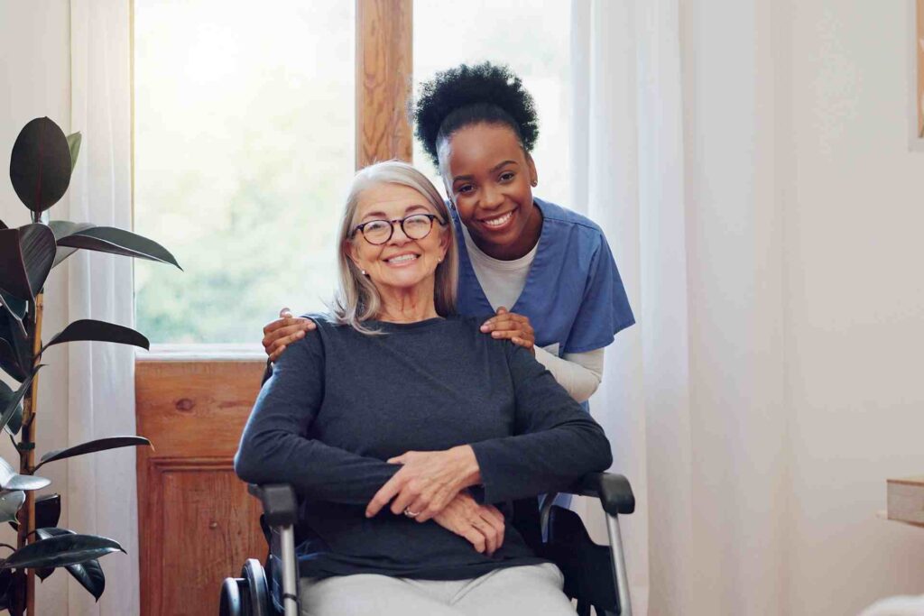 Caregiver assisting elderly woman at home with daily support and companionship